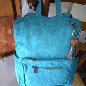 The Sak Teal Backpack with Tassel Charm